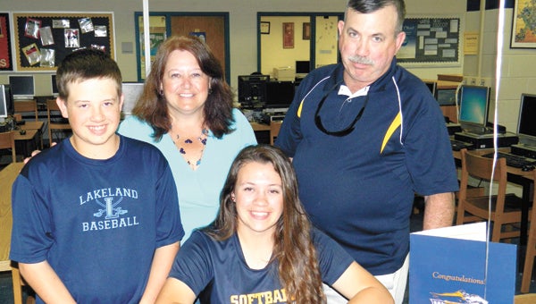Lakeland's Sarah Bowyer officially signed with North Carolina Wesleyan College on Wednesday at Lakeland High School with her brother, Peter, and parents, Carri and Bruce Bowyer, in attendance.