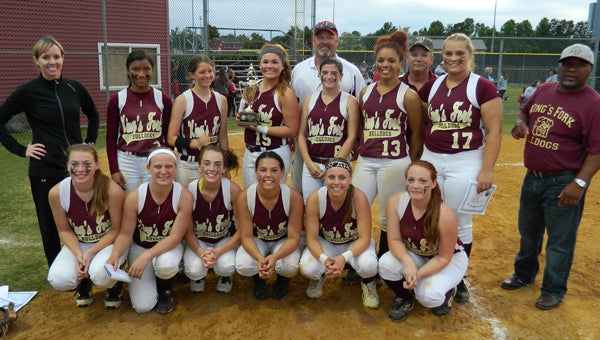 The 2014 King's Fork High School softball team celebrates after defeating Nansemond River High School on Friday to become the first Ironclad Conference tourney title holders.