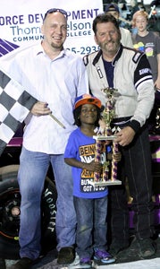 Jimmy Humblet celebrates in Victory Lane after his 50-lap pole-to-checkered flag win in the modified class at the NASCAR Whelen All-American Series events on Saturday at Langley Speedway. (Bill Carr/MotorSports Photo News Service)