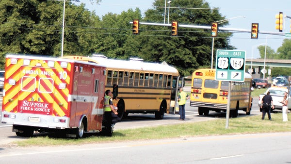 The scene Thursday on Bridge Road at Harbour View Boulevard, where a Creekside Elementary School bus with 51 students was involved in an accident caused by another vehicle making an unsafe lane change.