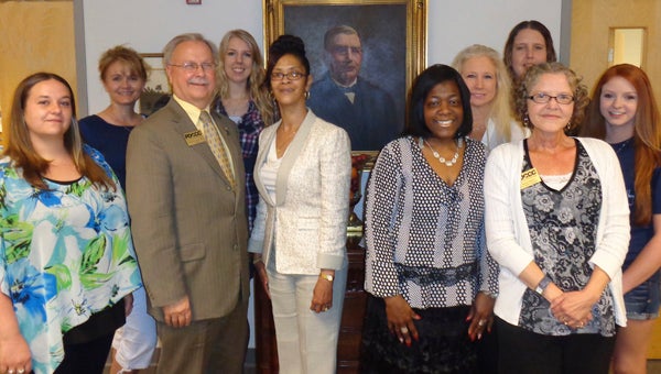 Paul D. Camp Community College recently selected its presidential student ambassadors. From left are Brandy Main, of Suffolk, Deanie Robertson, of Courtland, College President Paul Conco, Amber Ballance, of Zuni, Wanda Olden, of Suffolk, Pamela Reid, of Suffolk, Debra Bailey, of Gates, N.C., Michelle Chess, of Suffolk, Public Relations Specialist Wendy Harrison and Allie Best, of Franklin. Not pictured are Jacob Bradshaw, of Carrsville, Brittany Eley, of Windsor, Taylor Felts, of Franklin, Jennifer Massaroni-Bernocco, of Capron, Tracy Morales, of Carrollton, and Vice President of Institutional Advancement Felicia Blow.