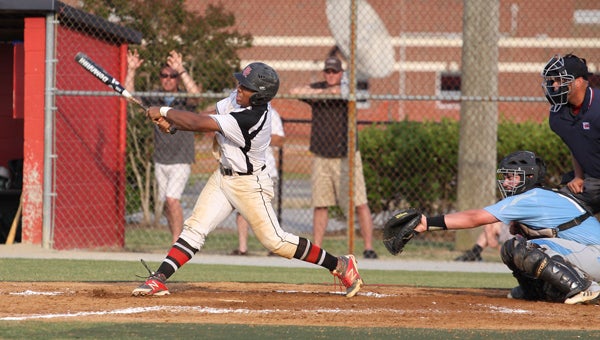 Nansemond River High School senior Shane Woods competes against visiting Hanover High School in Wednesday's regional semifinal. The Warriors fell 3-2 in eight innings. (Photo by Wil Davis/Wil Davis Photography)