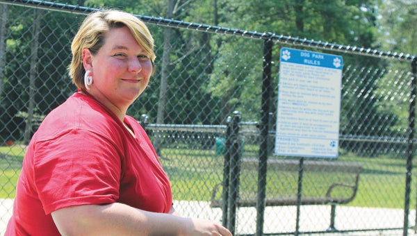 Suzette Vida, the city of Suffolk’s outdoor recreation specialist, gives a tour of the new Lake Meade Dog Park, which opens to the public on Saturday.