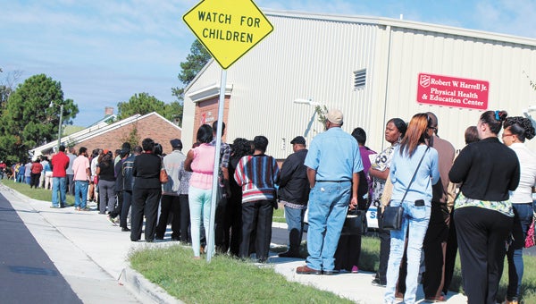 In 2013, hundreds of jobseekers line up to enter a job fair at the Salvation Army building on Bank Street. Attendance at the event far outstripped what organizers were expecting, prompting them to move it this year to King’s Fork Middle School.