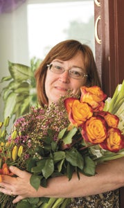 Jodi Cobb says one of the most difficult parts of her job is getting the flowers to go where she wants them to go.