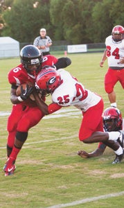 Nansemond River High School's DeShon Saunders will be a threat to run and to throw as the Warriors' primary option at quarterback this year.