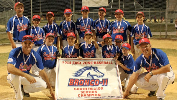 The SYAA 11U Bronco team won the recent PONY Baseball sectional tournament in Chesapeake in dramatic fashion. Front row, from left: coach Will Varnier, Zane Wise, Travis Williams, Joseph Frole, Carlin Walden, Nicholas Cleghorn, Logan Hurst and coach Steve Riddick; back row, from left: coach Lance Cleghorn, Ethan Willette, Darius Surrett, Logan Earley, Nate Varnier, Aidan Gay, Rylan Riddick and Johnny Gray. (Photo submitted by Lance Cleghorn)