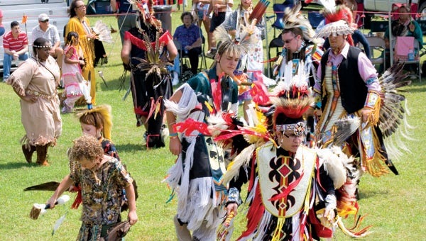 Traditional American Indian dances, music and colorful regalia are among the many sights to see at the Nansemond Indian Tribe’s powwow. The event began Saturday and continues today in Chuckatuck. (Troy Cooper photo)