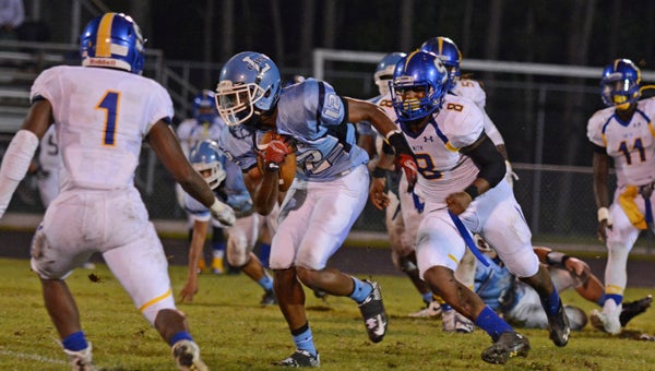 Lakeland High School senior Convon'Tra Revell was one of the bright spots for the Cavaliers on Friday during their 48-7 loss to visiting Group 6A heavyweight Oscar Smith High School. (Melissa Glover photo)