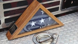 Also part of the traveling memorial was an American flag flown from a truck provided by Musco Lighting Team to illuminate Ground Zero during the long recovery and clean up.