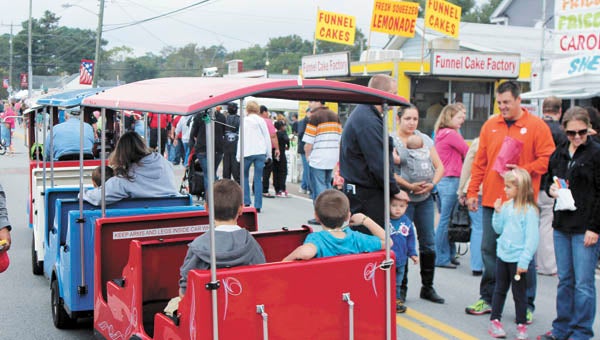 Folks enjoy the 2013 Driver Days annual fall festival. With professional wrestling and alcohol sales, organizers expect a large turnout for this year’s event this weekend.