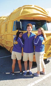 Melany Rodriguez, Mason Kerwick and Meghan Kruger brought the Planters NUTmobile to Suffolk on Wednesday to give reporter Matthew Ward a chance to see what it’s like to cruise around in one of the most unusual vehicles on the road.
