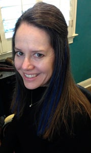 Maggie Morris Fears shows off the blue streaks in her hair that she put there when she met an initial fundraising goal for the American Diabetes Association's Tour de Cure.