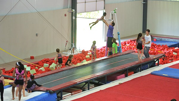 Young gymnasts enjoy a free open gym at World Class Gymnastics Too on Nansemond Parkway during the facility’s grand opening on May 2. The gym moved to the new location from its old spot on Bowen Parkway. (Photo submitted by Nicole Marshall)