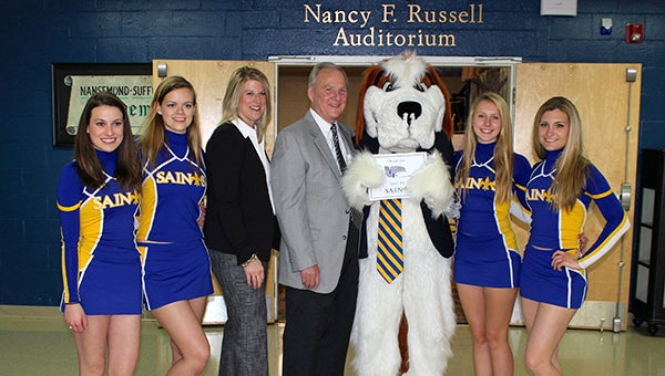 Nansemond-Suffolk Academy cheerleaders stand with Head of School, Deborah B. Russell, the Honorable Richard S. Bray, president of the Beazley Foundation Inc., and NSA’s mascot, Bernie. 