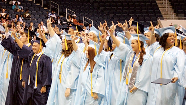 At ODU’s Ted Constant Center on Saturday, Lakeland High School’s 2015 graduates belt out the alma mater.