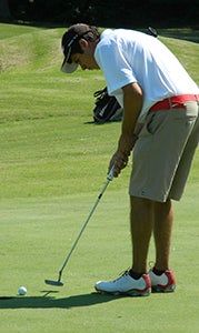 Nansemond River High School senior Ryan Fischer competes against Great Bridge High School on Aug. 13 at Bide-A-Wee Golf Course in Portsmouth. He is the Warriors' No. 1 player and looks to make another trip to the state tournament this year.