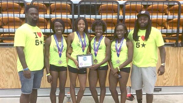 The Five Star Track and Field Club’s girls’ 4x400-meter relay team in the 17- to 18-year-olds division celebrates their win in the 2015 AAU Junior Olympic Games on Aug. 8 at Norfolk State University. From left: coach Brandon Tynes, Martha Sam, Candice James, Brandeé Johnson, Sarah Moore and coach Justin Byron. (Toy Redding photo)