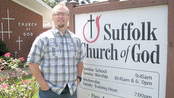 Aaron Burgess, a third-generation pastor, is the new pastor at Suffolk Church of God on Kilby Avenue.