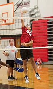 Nansemond River High School sophomore middle hitter Max Widegreen, a foreign exchange student, has come a long way from his home in Germany and is a key contributor for the Warriors this season.
