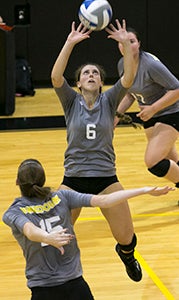 Freshman Brooks Gillerlain of Suffolk sets for her team at Randolph College during a match earlier this season. The WildCats (6-19) have struggled with a young team this year, but Gillerlain has helped put them in a position to potentially make the playoffs. (Randolph College Athletics)