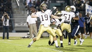 King’s Fork High School senior quarterback Ryan Kluck and the Bulldogs are getting set for a taste of Monday night football. Their game against Great Bridge High School will be played at Great Bridge Middle School.