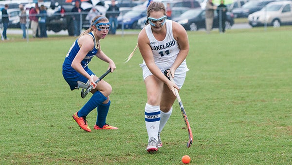 Lakeland High School senior Stasha Waterfield drives the ball forward against visiting Smithfield High School on Friday afternoon. She kick-started the Lady Cavs’ rally with a goal and assisted senior Shannon Leonard’s winning goal in overtime.