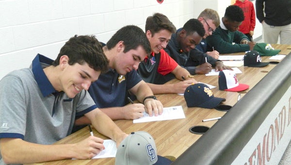 Nansemond River baseball players officially commit to their colleges of choice during a signing ceremony held last week at Nansemond River High School. From left: Michael Blanchard, Matthew Holt, Reid Williams, Wil Davis Jr., Andrew Halmrast and Dion Jordan.