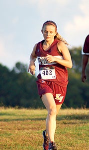 King’s Fork High School junior Paige Summers pushes herself during a run earlier this season. Her ability to thrive as a first-year cross country runner has led to her being the Duke Automotive-Suffolk News-Herald Player of the Week. (Caroline LaMagna photo)
