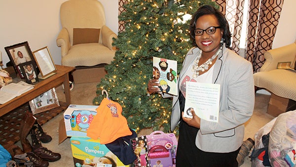 Quniana Futrell is founder of an organization that is providing Christmas gifts for the children of 20 Western Tidewater Regional Jail inmates.