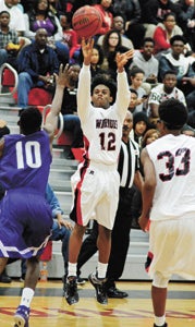Nansemond River High School senior guard Torrence Williams fires up a shot from the perimeter, something he may have the opportunity to do in a three-point competition airing on CBS during Final Four weekend in Houston, Texas. To vote for him, visit HighSchoolSlam.com. 