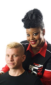 Sonja Horton, of Suffolk, shows the military style-inspired cut she gave a model during a live competition among six employees of Sport Clips Haircuts in San Antonio, Texas. Horton’s creation earned her an honorable mention. 