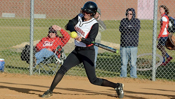 Nansemond River High School senior Lauren Maddrey swings against visiting Grassfield High School on Friday. She produced an outstanding 10-inning performance in the circle to put her team in the position to achieve its 2-1 victory. (Melissa Glover photo)