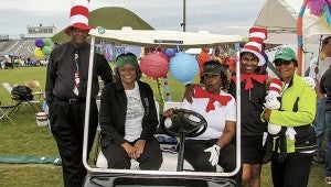 The Suffolk Chapter of the Links Inc. shows off its Dr. Seuss-themed gear during Relay for Life on Friday at Nansemond River High School. From left are John Spruiell, Vice President Duanne Hoffler-Foster, Team Captain Lynn Spruill, Gloria Spruiell and Deborah Austin.