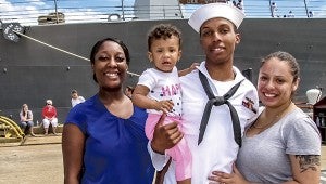 Churchland resident Byron Bullock deployed Wednesday on the guided-missile destroyer USS Nitze. His wife, Yvonne, right, daughter, Makayla, and sister, Tonjanieka, left, a Suffolk resident, came to say goodbye.