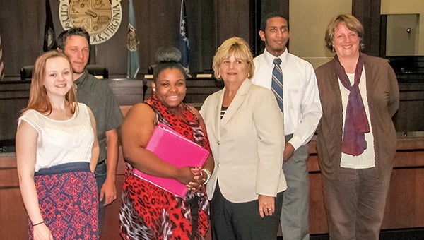 Lakeland High School students pose for a photo with Mayor Linda T. Johnson after they presented research projects to City Council on June 1. From left are Allison Boles, Koby Chavez, Asia Woodson, Johnson, Adam-Mitchell Phillips and the students’ government teacher, Gail Barker.