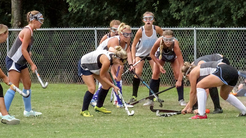 Alex Kinsey, Maddy Carr, Kendall Lewis, Maakayla Snyder and Ashton Moore battle in a recent practice drill. Lakeland lost to Hickory 5-2 on Wednesday.