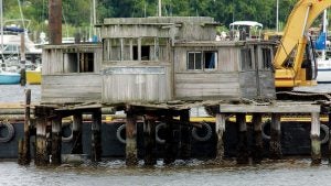 In 2003, the former deckhouse of the Captain John Smith ferry was split in two, raised from the river and trucked back home to Surry, where a developer had planned to use it as part of a commercial/restaurant center near the ferry docks on the James River.