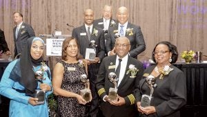 Two Suffolkians were honored by Dominion Resources and the Library of Virginia during its “Strong Men and Women in Virginia History” program earlier this month. On far right, Dr. Margaret Ellen Mayo Tolbert was among the adults honored. 